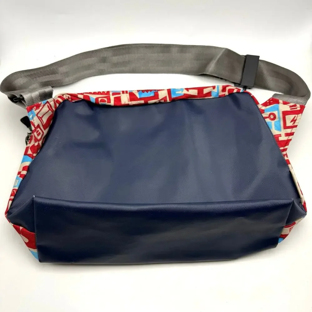 Gregory Water Resistant Flap Front Messenger Shoulder Bag Red Blue Cityscape